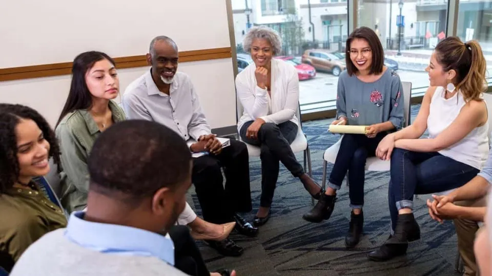 Diverse group of patients in a shared medical appointment discussion circle